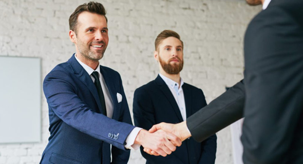 Austin Business Professionals Shaking Hands